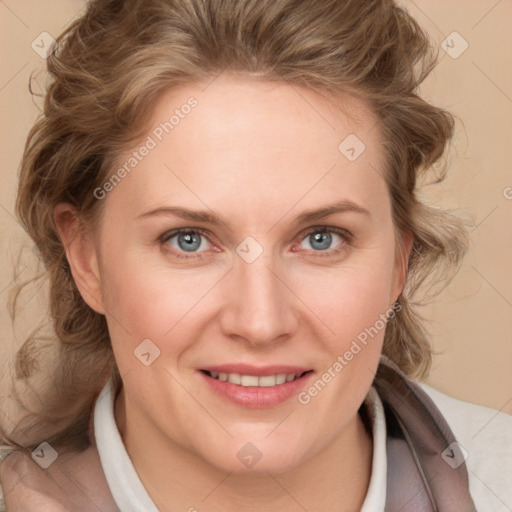 Joyful white adult female with medium  brown hair and blue eyes