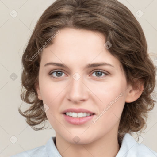 Joyful white young-adult female with medium  brown hair and green eyes