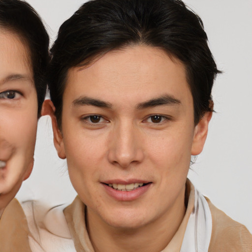 Joyful white young-adult male with medium  brown hair and brown eyes