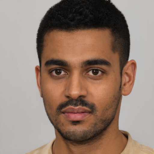 Neutral latino young-adult male with short  black hair and brown eyes