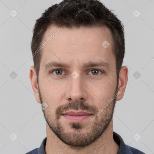 Neutral white young-adult male with short  brown hair and grey eyes