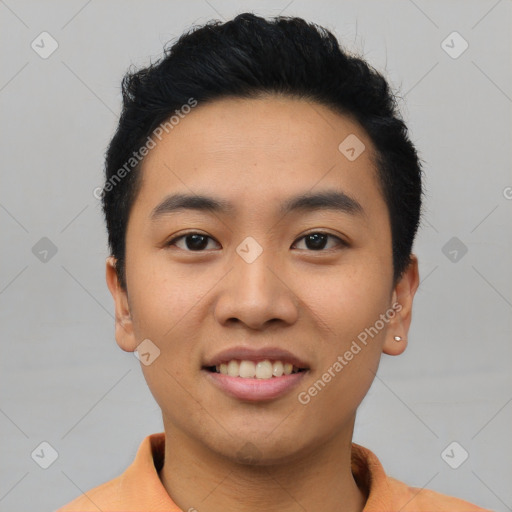 Joyful asian young-adult male with short  black hair and brown eyes