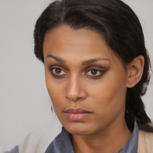 Neutral latino young-adult female with short  brown hair and brown eyes