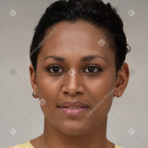 Joyful black young-adult female with short  brown hair and brown eyes