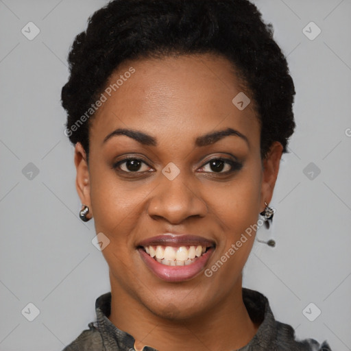 Joyful latino young-adult female with short  black hair and brown eyes