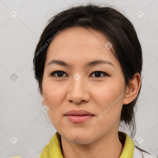 Joyful white adult female with medium  brown hair and brown eyes