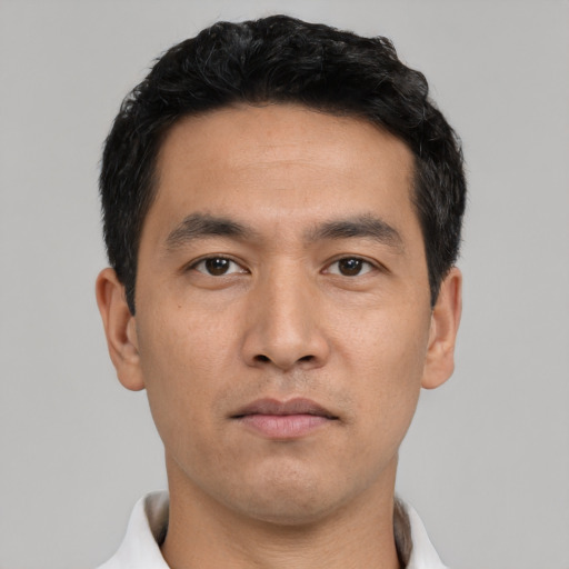 Neutral asian young-adult male with short  black hair and brown eyes