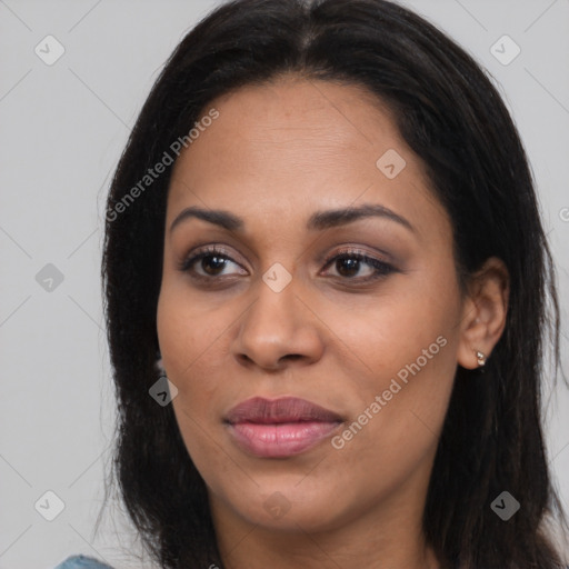 Joyful latino young-adult female with long  brown hair and brown eyes