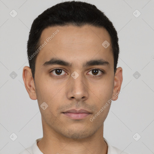 Neutral latino young-adult male with short  black hair and brown eyes