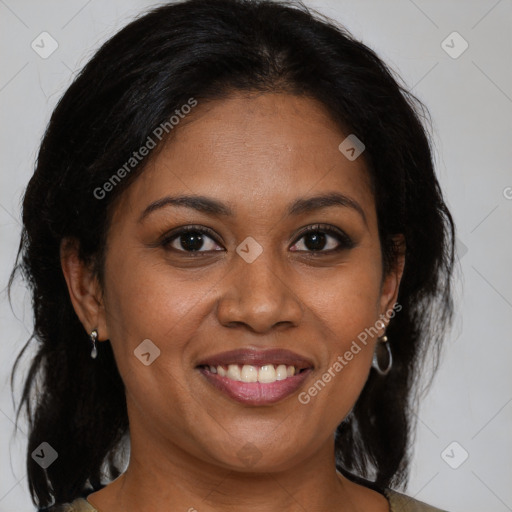 Joyful black young-adult female with medium  brown hair and brown eyes