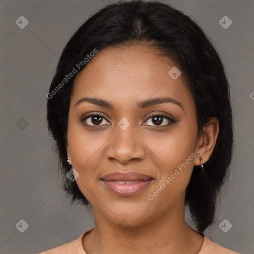 Joyful black young-adult female with medium  black hair and brown eyes