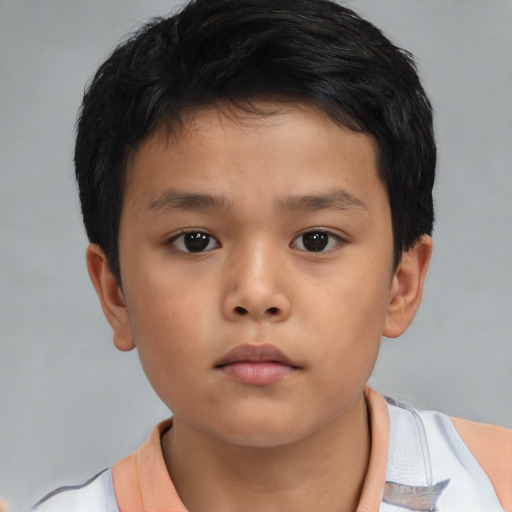 Neutral asian child male with short  brown hair and brown eyes