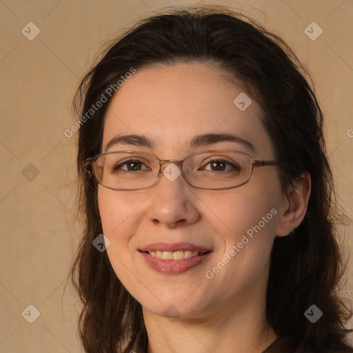 Joyful white adult female with long  brown hair and brown eyes