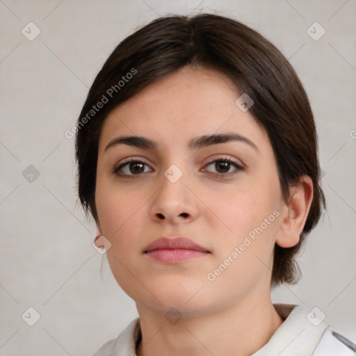 Neutral white young-adult female with medium  brown hair and brown eyes