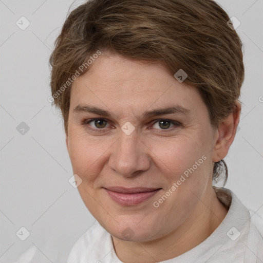 Joyful white adult female with short  brown hair and brown eyes