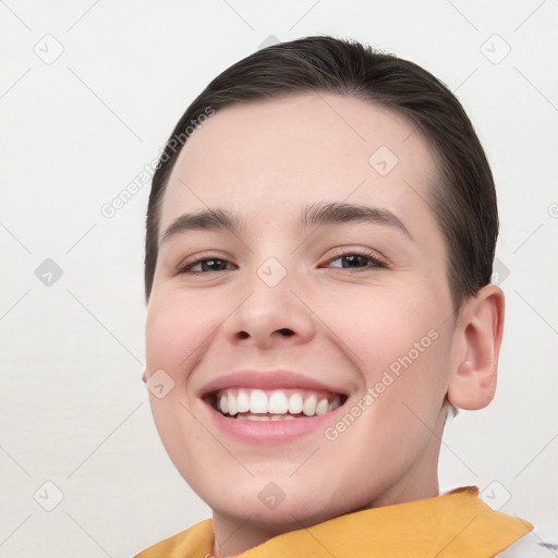 Joyful white young-adult female with short  brown hair and brown eyes