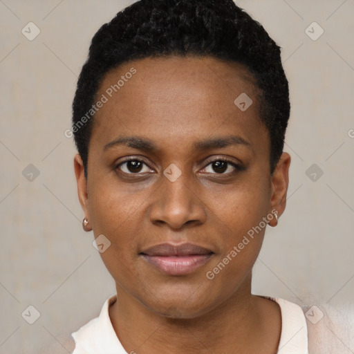 Joyful black young-adult female with short  black hair and brown eyes