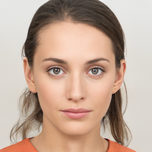 Neutral white young-adult female with medium  brown hair and brown eyes