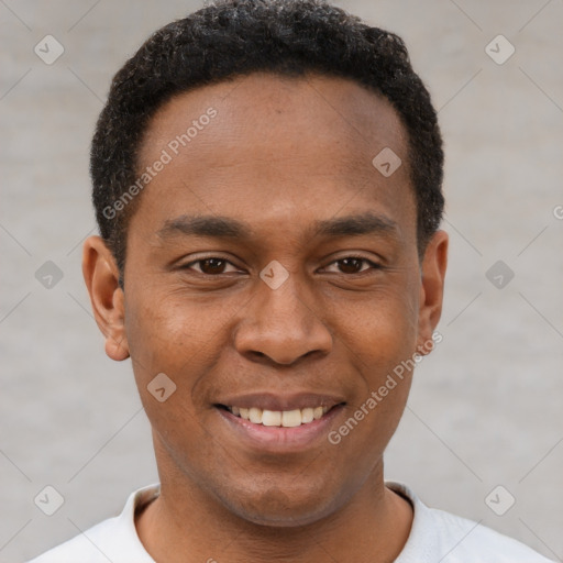 Joyful latino young-adult male with short  brown hair and brown eyes