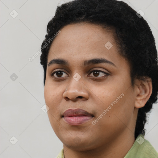 Joyful latino young-adult female with short  black hair and brown eyes