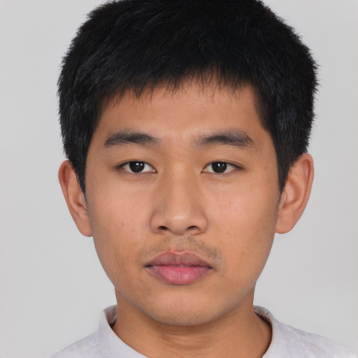 Neutral asian young-adult male with short  black hair and brown eyes
