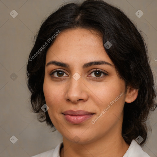 Joyful latino young-adult female with medium  brown hair and brown eyes