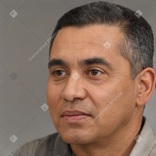 Joyful white adult male with short  black hair and brown eyes