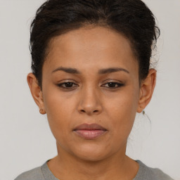 Neutral black young-adult female with short  brown hair and brown eyes