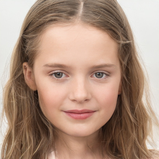 Joyful white child female with long  brown hair and grey eyes