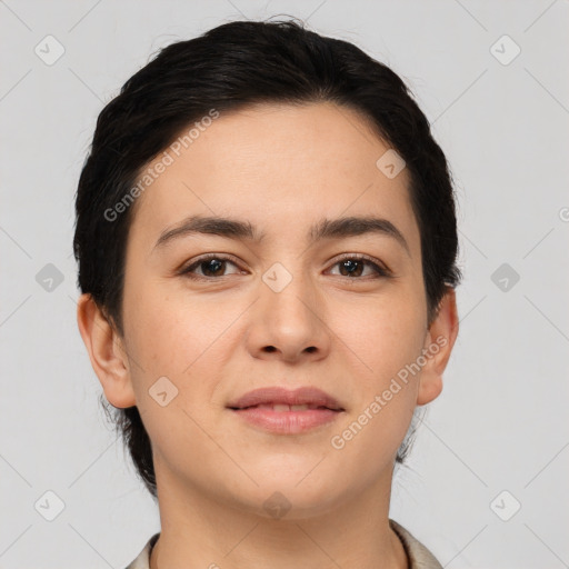 Joyful white young-adult female with short  brown hair and brown eyes