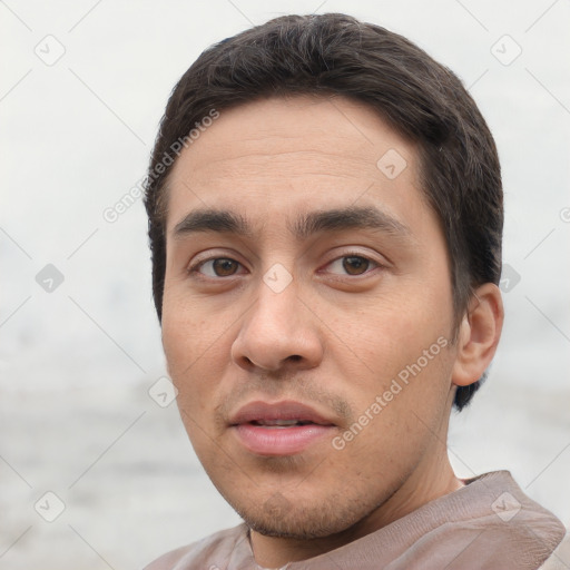 Joyful white young-adult male with short  black hair and brown eyes