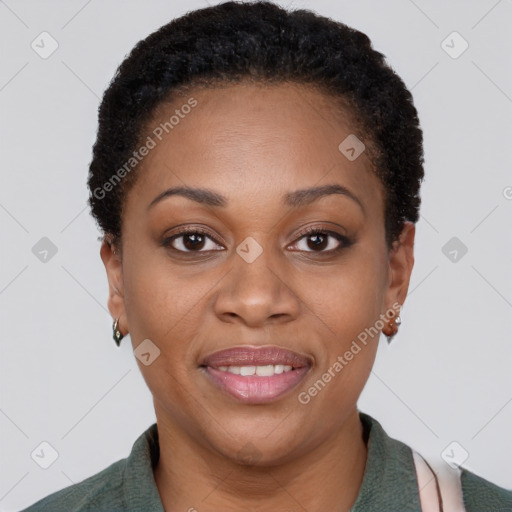 Joyful black young-adult female with short  brown hair and brown eyes