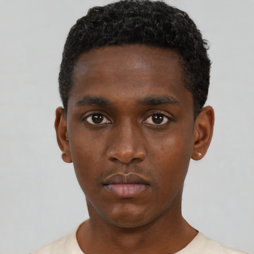 Neutral black young-adult male with short  black hair and brown eyes