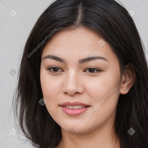 Joyful asian young-adult female with long  brown hair and brown eyes