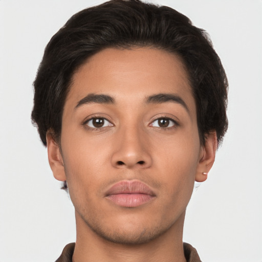 Neutral latino young-adult male with short  brown hair and brown eyes