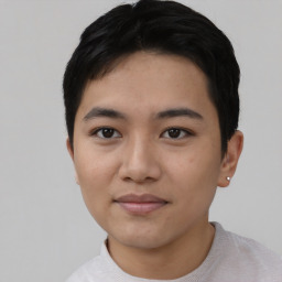 Joyful asian young-adult female with short  black hair and brown eyes