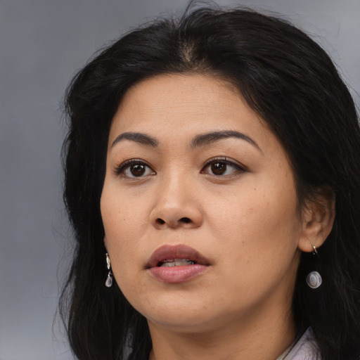 Neutral asian young-adult female with long  brown hair and brown eyes