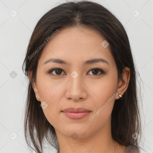 Joyful white young-adult female with long  brown hair and brown eyes