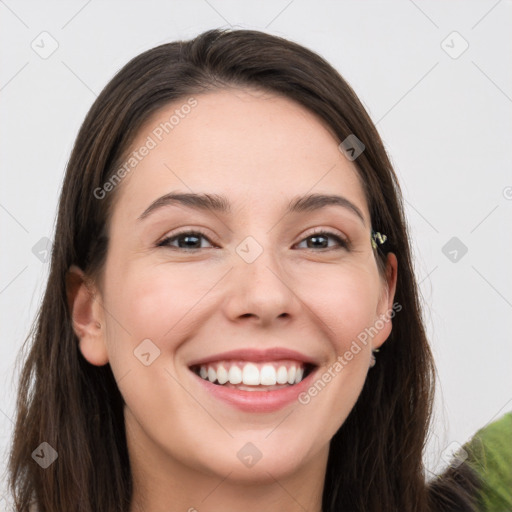 Joyful white young-adult female with long  brown hair and grey eyes