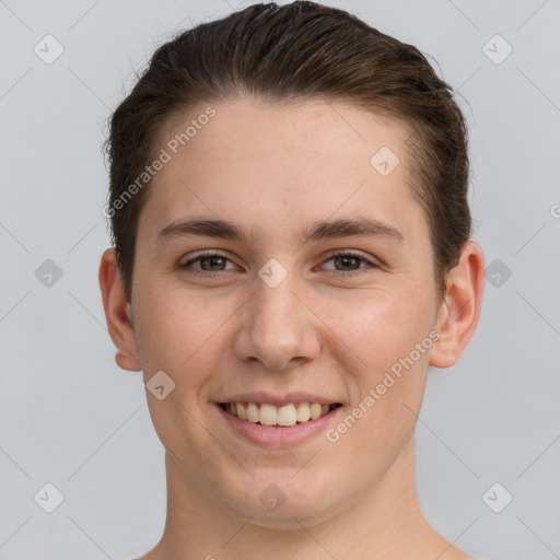 Joyful white young-adult female with short  brown hair and grey eyes