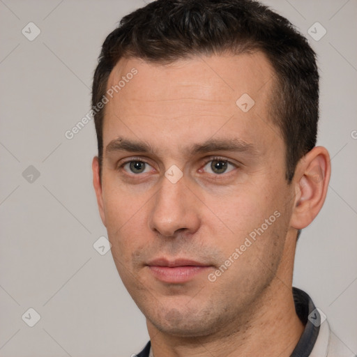 Neutral white young-adult male with short  brown hair and brown eyes