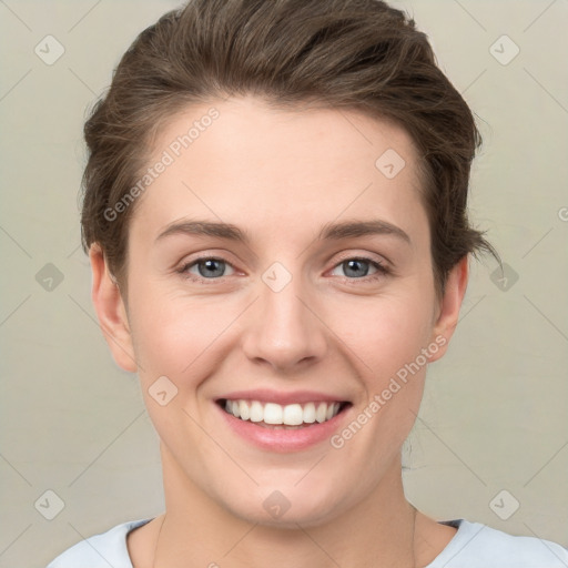 Joyful white young-adult female with medium  brown hair and green eyes