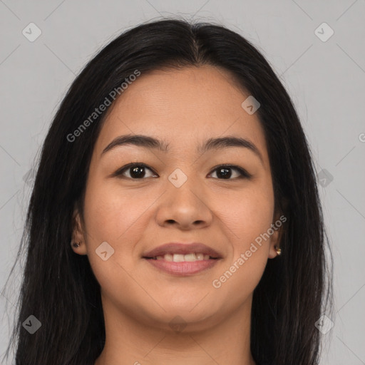 Joyful asian young-adult female with long  brown hair and brown eyes