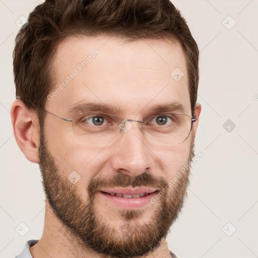 Joyful white adult male with short  brown hair and grey eyes