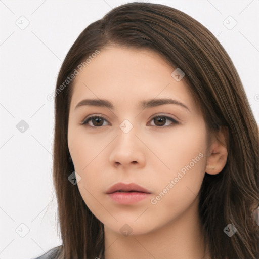 Neutral white young-adult female with long  brown hair and brown eyes