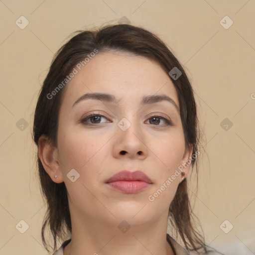 Neutral white young-adult female with medium  brown hair and brown eyes