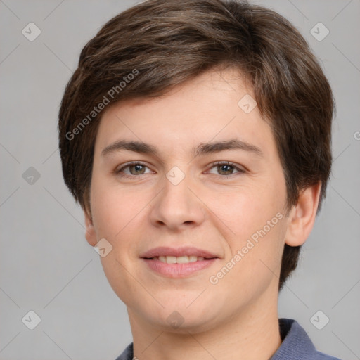 Joyful white young-adult female with short  brown hair and grey eyes