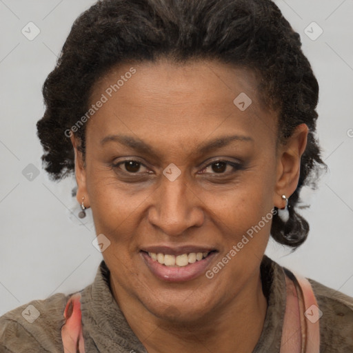 Joyful black adult female with short  brown hair and brown eyes