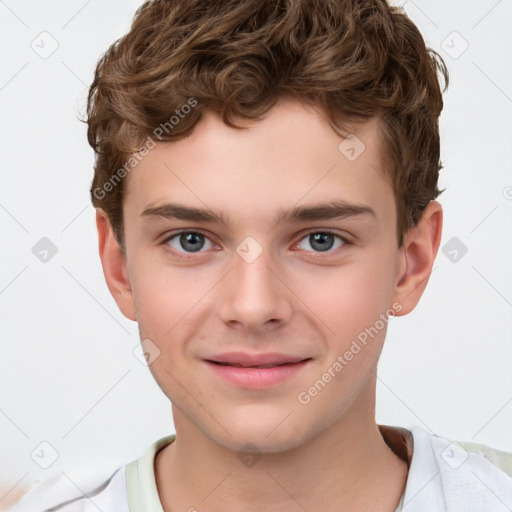 Joyful white child male with short  brown hair and brown eyes