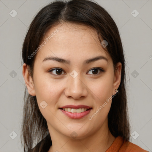 Joyful latino young-adult female with medium  brown hair and brown eyes